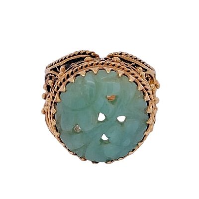 Carved Jade Filigree Ring, 14K Gold. Circa: 1920s, Gemstone: Hand-carved jade, Design: Filigree