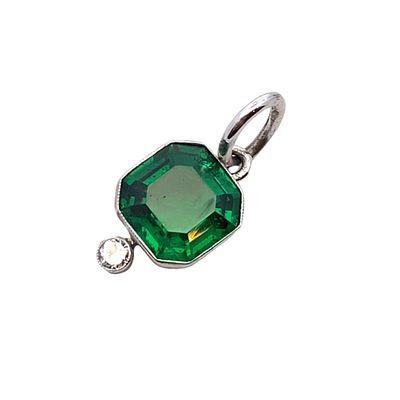 Synthetic Emerald and Diamond Pendant in 18 White Gold. Metal type: 18k white Gold, Gemstones: