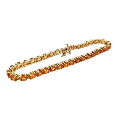 22.0CTW Orange Garnet Tennis Bracelet, 14K Gold. 14k yellow gold tennis bracelet with oval