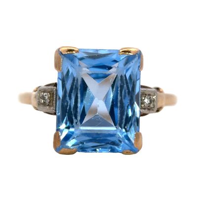 Blue Stone and Diamond Ring in 10K Yellow Gold. Metal type: 10k yellow gold, Gemstones: Blue