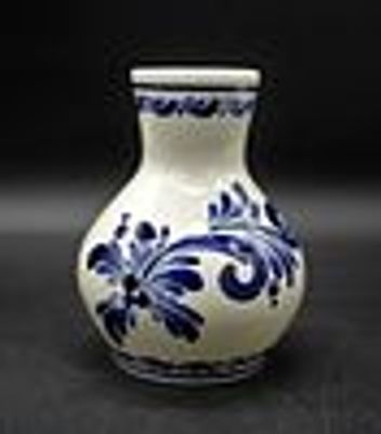 faience mug
. Viana do Castelo, marked on the base, bulging stoneware body with blue floral 