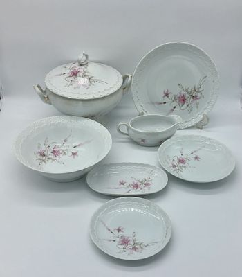 Limoges Porcelain G. Labesse Dinner Service
. Molded and relief Limoges marked on the base, with 