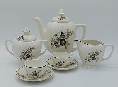 Coffee Service in Portuguese Faience
. Marked on the Sacav&eacute;m base, with teapot, sugar bowl, milk 