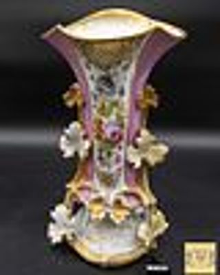 Porcelain vase. Old Paris, with a wavy edge and gilded edging, with side appliqu&eacute;s in the form 