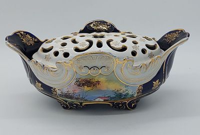 Flowerpot in Portuguese Faience
. Marked on the base Alcoba&ccedil;a, edge cut and edged in gold 