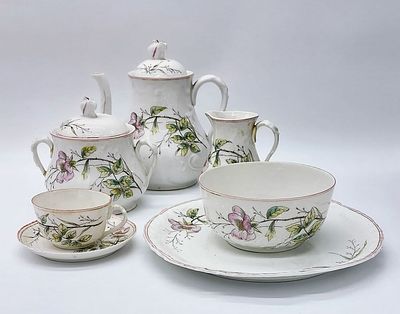 Porcelain Tea Service. Molded and relief marked on the base Vidraria Moderna by F. D&acute; Oliveira 