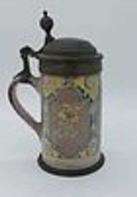 Faience Beer Mug
. 19th century, polychrome floral decoration on a white glazed background, with 