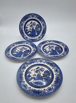 Four English Earthenware Plates
. Unmarked on the base, four dessert plates with blue decoration
