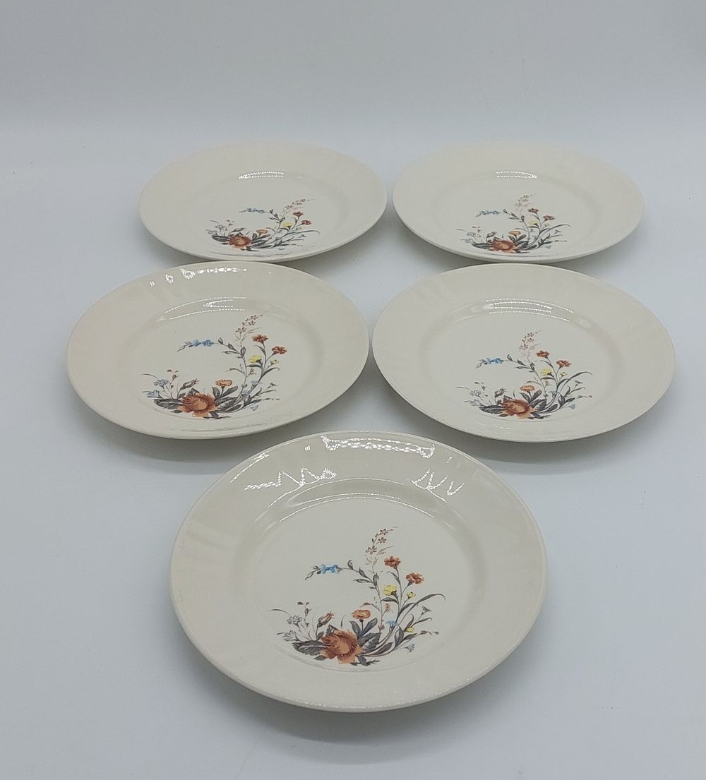 Five Portuguese Earthenware Dishes
. Marked on the base, wavy edge in the center with polychrome 