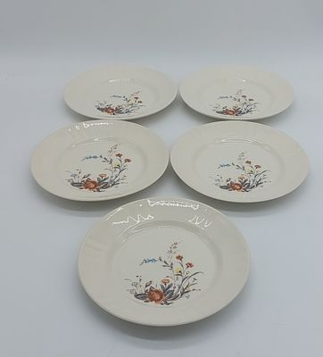 Five Portuguese Earthenware Dishes
. Marked on the base, wavy edge in the center with polychrome