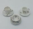 Three European Porcelain Cups
. Molded and embossed, unmarked, various models with polychrome Image - 1