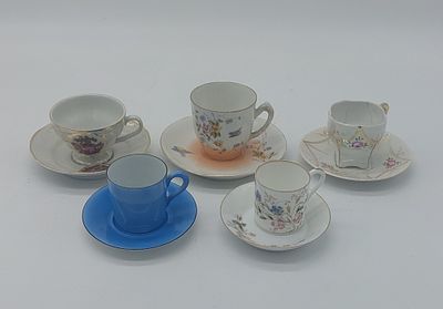 Five European Porcelain Coffee Cups
. Molded and embossed, unmarked, various models with floral