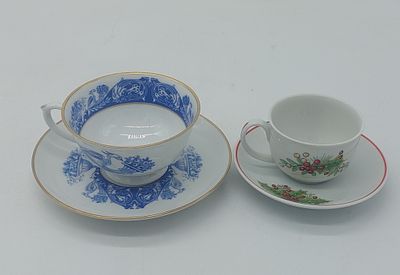 Two Portuguese Porcelain Cups
. Molded and embossed, from the Vista Alegre factory, marked on