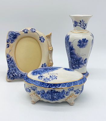 Three Pieces in Portuguese Porcelain
. Molded and embossed, marked on the base, Royal Art, jar