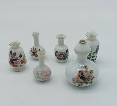 Assortment of 6 Portuguese Porcelain Miniatures
. Molded and embossed, marked on the base