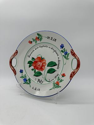 European Porcelain Toast Plate
. Blue edged edge, polychrome floral decoration on a white glazed