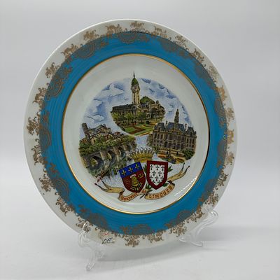 French Porcelain Plate
. Marked on the base Limoge France, edge decorated in gold in geometry on