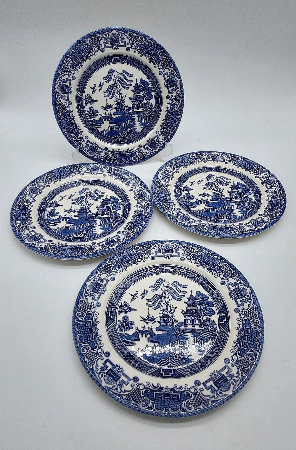 Four English Earthenware Plates
. Marked on the base, four sided plates with blue decoration in 