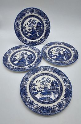 Four English Earthenware Plates
. Marked on the base, four sided plates with blue decoration in