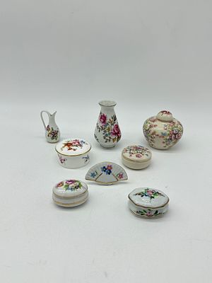 Eight Porcelain Miniatures
. Molded and embossed, marked on the base, various shapes and forms