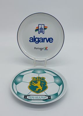 Two Advertising Plates in Portuguese Porcelain
. Molded and relief, one marked on the base, edge