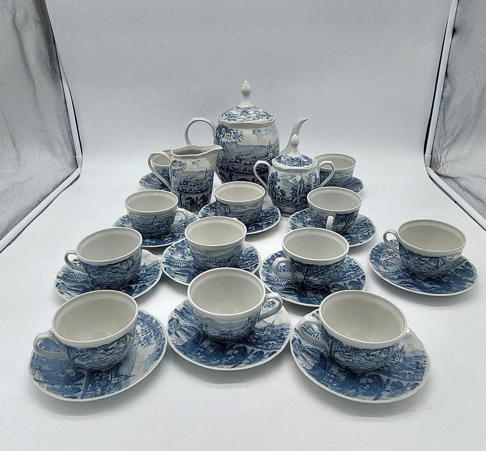 Portuguese Porcelain Tea Service
. Molded and embossed, marked on the base S P Coimbra, kettle 