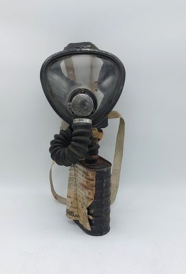 Old Siebe Gorman Puretha Canister Gas Mask
. Mask with tube and filter with head support straps