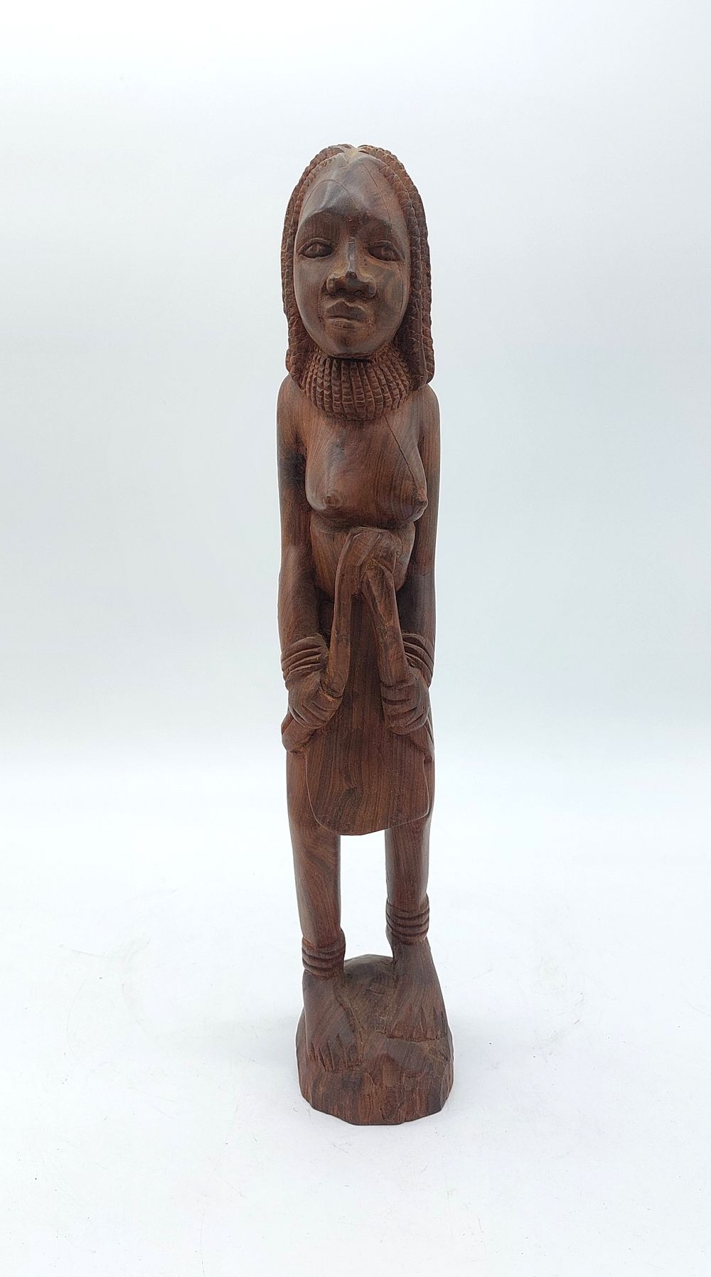 African Rosewood Crafts
. Sculpture representing a woman, body carved in rosewood with carvings 