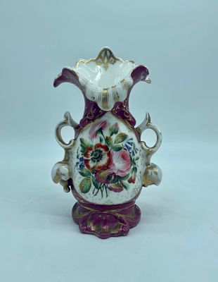 Porcelain vase. Old Paris style porcelain vase. The rim of the piece is cut out and edged in