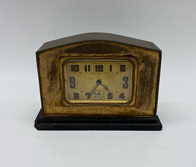 Antique table-top alarm clock. Metal body with three-hand winding clock, made in France. With