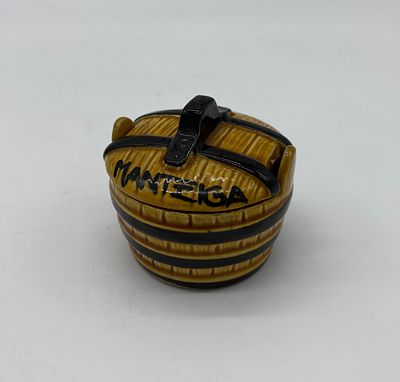 Faience butter dish. Circular-shaped body with lid. Polychrome hand-painting. It measures 8.5 x