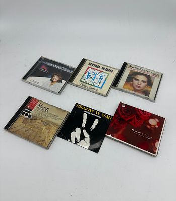 Six diverse CDs: 
1. 'Congo Square' by Kuni Kids; 
2. 'Concerto for Piano and Orchestra No. 26 