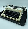 Olympia Regina de Luxe typewriter. Plastic body with metal parts. Functional machine with black Image - 1