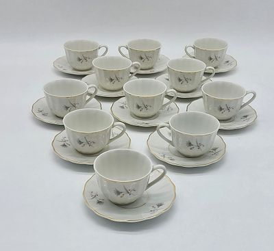 Eleven Portuguese Porcelain Coffee Cups
. Molded and embossed from the Candal factory, marked on 