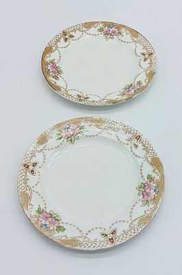 Two Oriental Porcelain Dessert Plates
. Molded and relief, marked on the base, edge with floral 