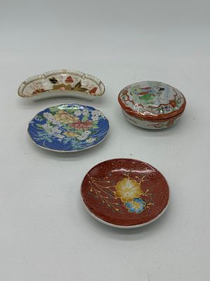 Four Porcelain Pieces
. Molded and embossed, jewelry holder, covilhete and two small plates with 
