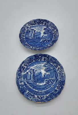 Two Japanese Porcelain Plates
. Marked at the base, edges cut and edged in gold, with floral 