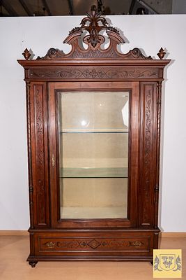 Showcase in Walnut Wood. Showcase with glazed door, glass sides, large drawer in the plinth 
