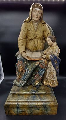 Saint Anne Teaching Our Lady to Read. Wooden image from the 17th century. XVII depicting Santa 