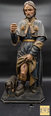 Image of San Roque. In wood from the sec. XVIII representing a saint and his faithful friend 