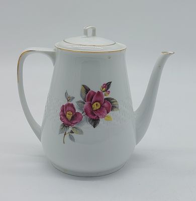 Portuguese Porcelain Teapot
. Molded and embossed, marked on the base, Spal, Coimbra, edges 