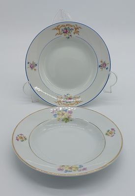 Two Portuguese Porcelain Plates
. Molded and relief, marked on the base, Candal, edges trimmed 