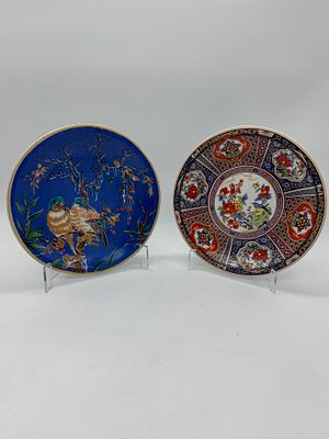 Two Plates in Oriental Porcelain
. Molded and relief, marked on the base, with oriental style 