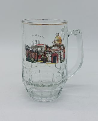 Glass Mug
. Cylindrical body with openwork handle, with raised and polychrome decoration. 