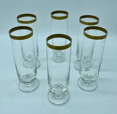 Six Glass Flutes. Set of six glass flutes in Art Deco style. 
Chunky footed glass with a short 
