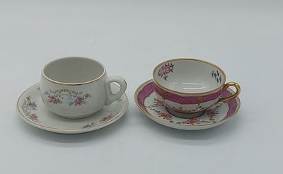 Two Portuguese Porcelain Cups
. Molded and embossed, marked on the base, Candal and Artibus 