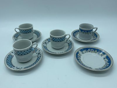 Four Porcelain Coffee Cups
. Cylindrical-shaped bodies with polychrome floral decoration on a 