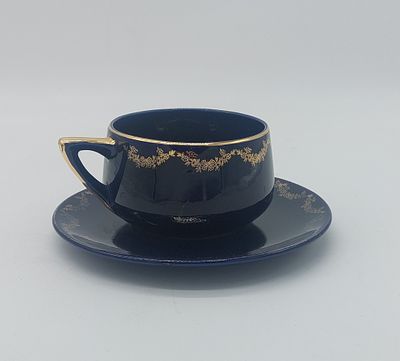 Portuguese Earthenware Lunch Cup
. Marked on the base, cylindrical body with gold floral 