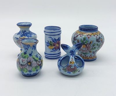 Five Decorative Pieces in Portuguese Earthenware
. Marked on the base, various models, with 