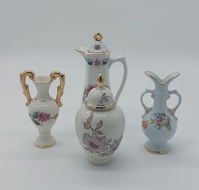 Four Pieces in European Porcelain
. Molded and embossed, marked on the base, different models 